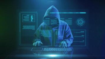 cybercriminal hacker in a mask enters text on the keyboard video