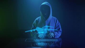 a cybercriminal hacker in a black mask hacks a airplane video