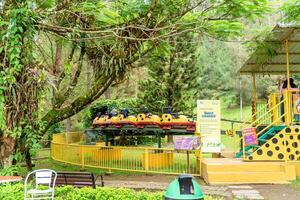 Berastagi, North Sumatra, Indonesia - September, 26 2021. Tourist are travelling playing and recreation at Mikie Holiday Resort or Mikie Funland Berastagi - North Sumatra photo