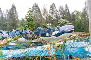 Berastagi, North Sumatra, Indonesia - September, 26 2021. Tourist are travelling playing and recreation at Mikie Holiday Resort or Mikie Funland Berastagi - North Sumatra photo