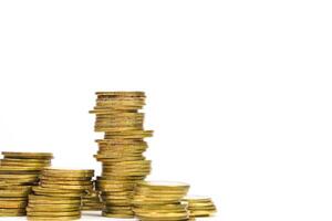 Pile of golden money coin on white background. Business, profit and financial concept. photo