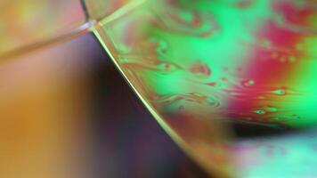 Green reflections, bright warm light, fluid abstraction, Natural background, minimalistic abstraction, minimalistic oil background, 4k high quality, biological cells video