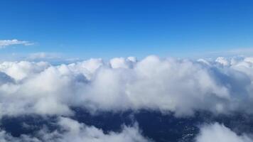 View from an airplane of the peaceful clouds passing by. video