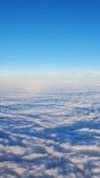 View from an airplane of the peaceful clouds passing by. video