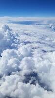 View from an airplane of the peaceful clouds passing by. video