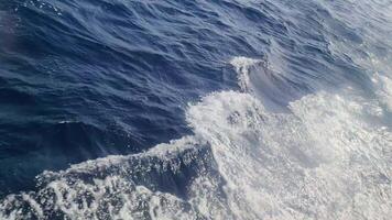 The churning water behind a boat in the Mediterranean caused by the powerful boat engine at full speed. video