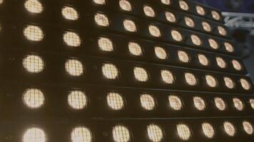 LED panel. Stock footage. Glowing panel with LED lights. LED panel for illumination of filming or shows. Equipment for lighting shows and filming video