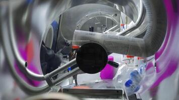 Work in the laboratory. Stock footage. A closed light space with various test tubes and chemical elements and scientists. video