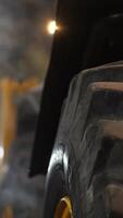 vertical running tractor in the garage. warming up the tractor engine video