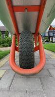 vertical Pov Close-up view of a wheelbarrow wheel plan, top view video