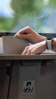 vertical passenger in a modern train carriage garbage into a special bin video