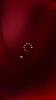Loading circle vertical animation on a red blurry background video