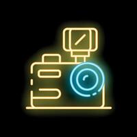 Neon sign of a photo camera with flash light emitting a glowing blue and yellow light vector