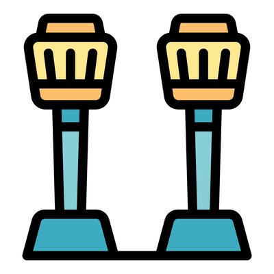 Pair of tiki torches burning with fire for luau party decoration