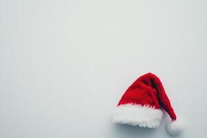 Red Santa Hat with White Trim on a White Background photo