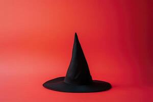 Black Witch's Hat on a Red Background photo