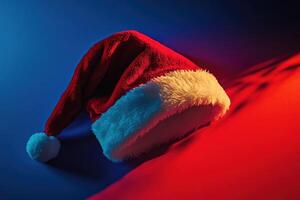 Red Santa Hat with White Fur Trim on Blue and Red Background photo