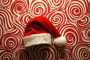 Red Santa Hat on a White and Red Swirling Background photo