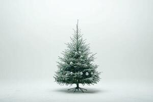 Decorated Christmas Tree on a Snowy Surface photo