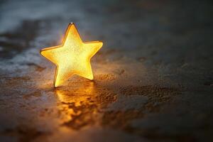 Glowing Golden Star on a Dark Surface photo
