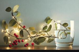 Twinkling Lights on Eucalyptus Branch with Red Berries and Water photo