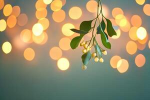 Mistletoe Branch with White Berries and Golden Bokeh Lights photo