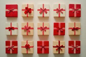 An Arrangement of Red and Beige Gift Boxes with Red Ribbons and Bows photo