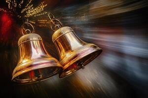 Two Golden Bells Against a Blurred Background of Light photo