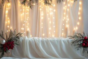 White Candles, Christmas Ornaments, and Twigs on White Drape with String Lights photo