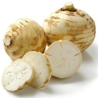 A collection of sweet potato roots and tops, with the distinctive bone pattern on their surfaces. photo