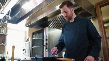 Chef cooking beef steak in frying pan video
