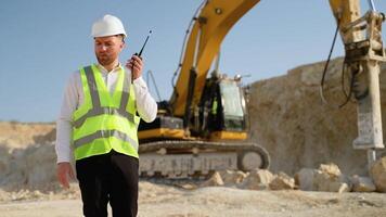 Industrial worker engineer use radio walkie talkie at quarry video