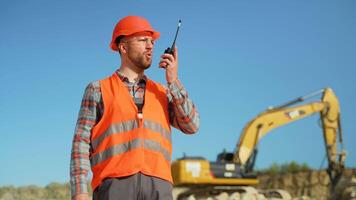 Industrial worker engineer use radio walkie talkie at quarry video