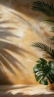 Lush green plant casting shadows on a textured golden wall in a bright indoor setting photo