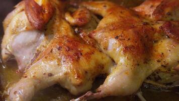 A plate of chicken is cooked and ready to be served. The chicken is golden brown and has a crispy texture. The dish looks delicious and inviting, and it is likely to be a popular choice for a meal video
