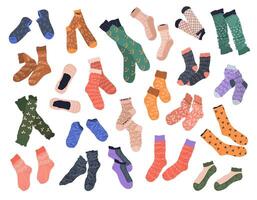 Big collection of trendy cotton, nylon, woolen, and sports socks with different patterns and textures. isolated flat illustrations on a white background. Clothing, apparel and garments set. vector