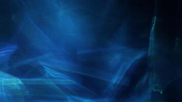 A blue and black background with a man in a suit video