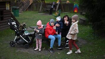 Happy Family Enjoying a Picnic in the Park on an Autumn Day video