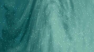 Abstract Teal Background with White Specks video