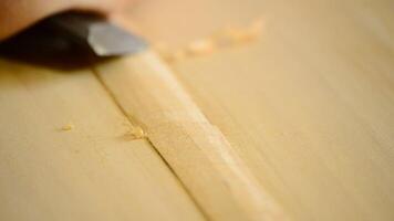 Luthier, carpenter or craftsman with chisel, close up. video