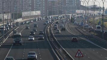 Cars crowd circulating with traffic in a highway at sunset video