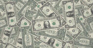 Animation with movement toward the center of mountain of bills of one dollar american, cash money video