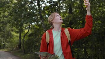 No connection in the forest. Hiking, smartphone and woman with nature, hands and typing for direction, digital app and hobby. video