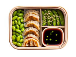 asian-inspired lunchbox with dumplings soy sauce edamame and sugar snap peas on isolated background png