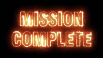 MISSION COMPLETE - Seamless looping text animation with fiery text and black background. video