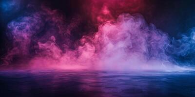 Pink And Blue Smoke Swirling Above A Reflective Surface photo