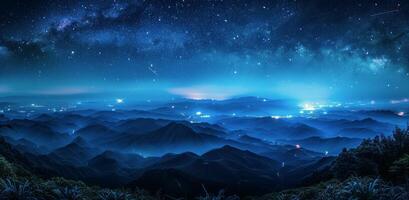 Night Sky Over Silhouetted Mountains With The Milky Way photo
