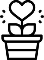 A heart shaped plant in a pot with a heart vector