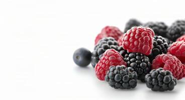 Blackberries and Raspberries on White Background photo
