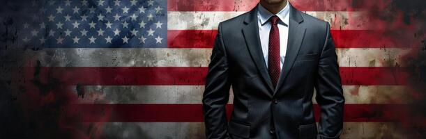 Man in Suit Standing Before Worn American Flag photo